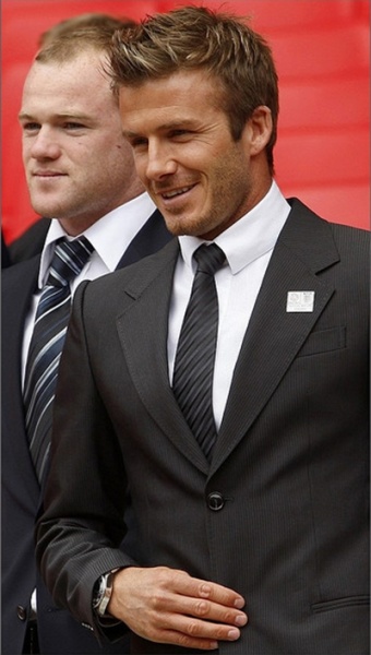 David Beckham and Wayne Rooney on the background