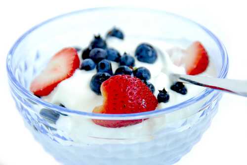 Low-fat yogurt with strawberries and blueberries